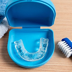Sportsguard in case sitting next to brush