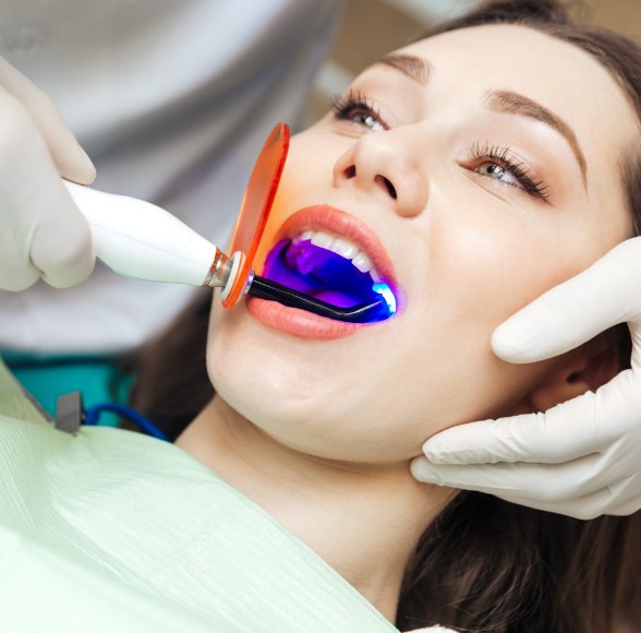 Patient receiving cosmetic dental bonding treatment