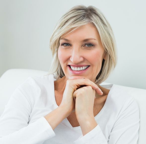 Woman with gorgeous smile after makeover