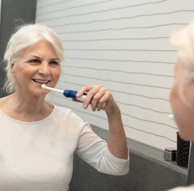 Woman brushing her teeth