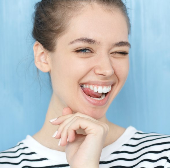 Young woman with beautiful smile after Invisalign