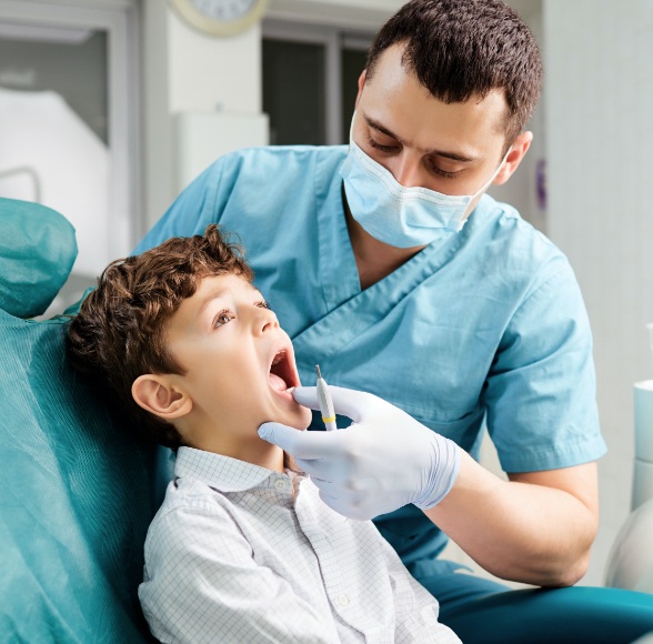 Child receiving dental exam