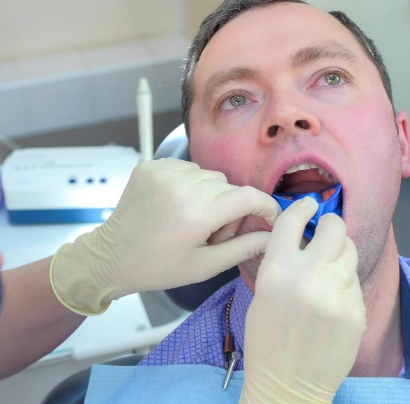 Patient receiving fluoride treatment