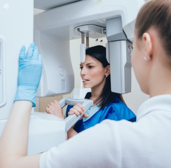 Patient receiving cone beam C T scanner x-rays