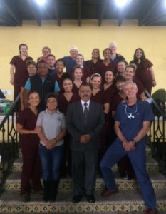 group shot on stairs with Antigua mayor