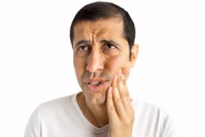 man with toothache