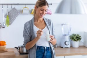 woman eating foods that whiten teeth