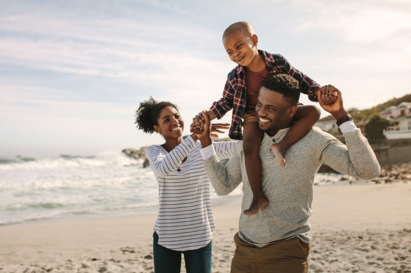 family at the beach during summer vacation