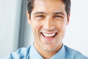 a closeup of a smiling patient’s face