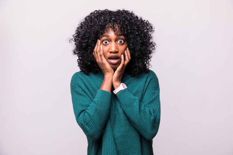 Woman has frightened expression