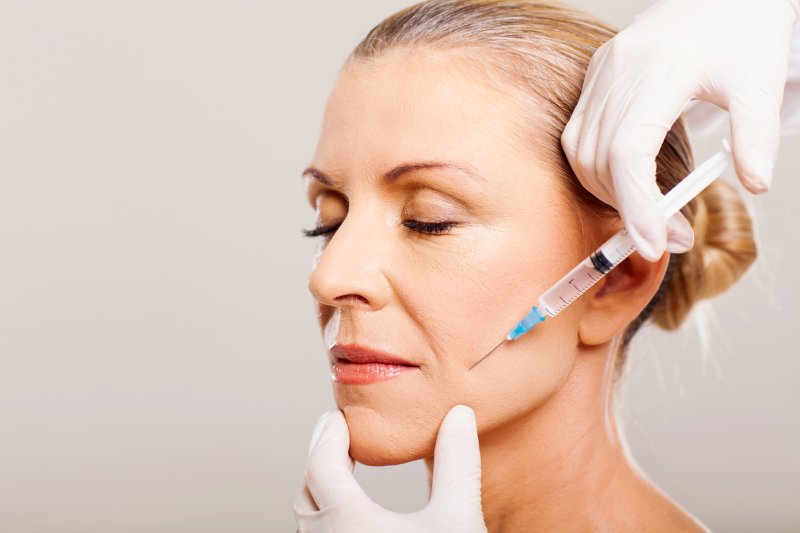 Lady receives BOTOX injections